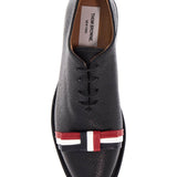 ELEGANT WHOLECUT SHOES IN BLACK CALFSKIN WITH RWB BOW