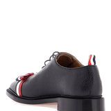 ELEGANT WHOLECUT SHOES IN BLACK CALFSKIN WITH RWB BOW