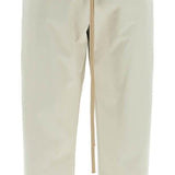 WIDE LEG NYLON TRACK PANTS IN CEMENT