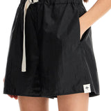 SILK AND NYLON SHORTS WITH BELT IN A