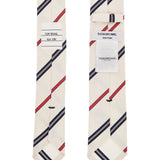 CLASSIC IVORY TIE WITH RED AND BLUE STRIPES IN SILK AND COTTON